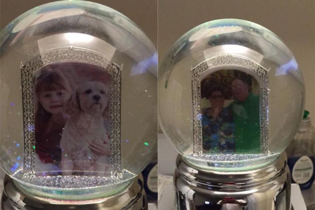 Family portraits in personalized snow globe