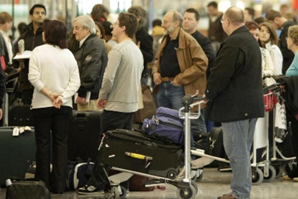 Passengers queuing at airport