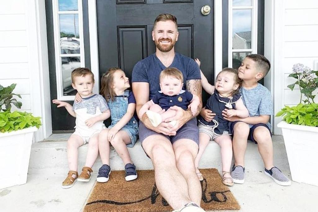 Jacob Young Poses with His Children