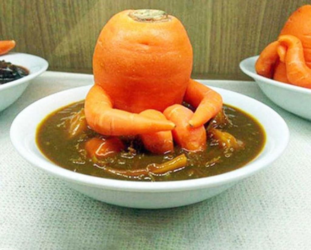 sad carrot in soup