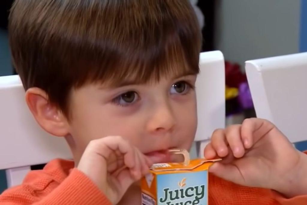 Boy Drinking Juice Box