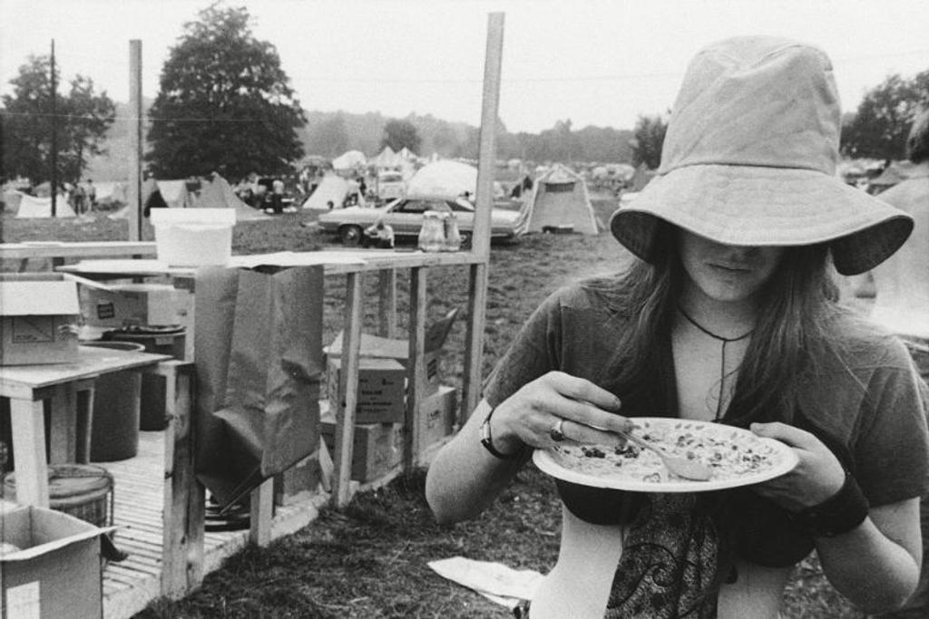 Woodstock Attendee Eating Food
